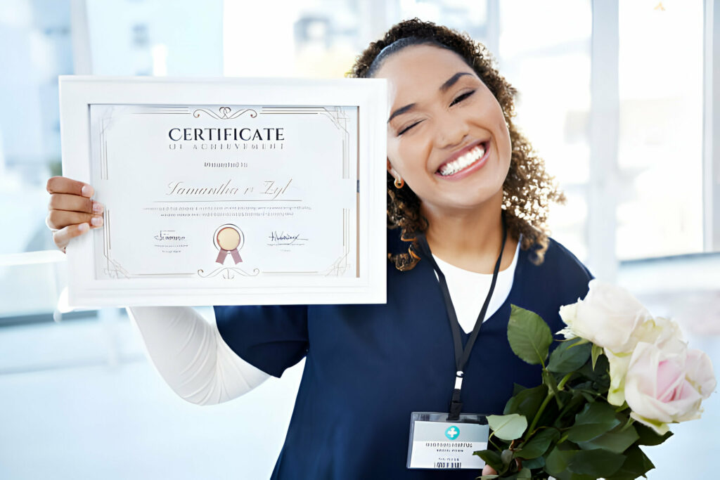A joyful healthcare professional holding a certificate of achievement and a bouquet of roses